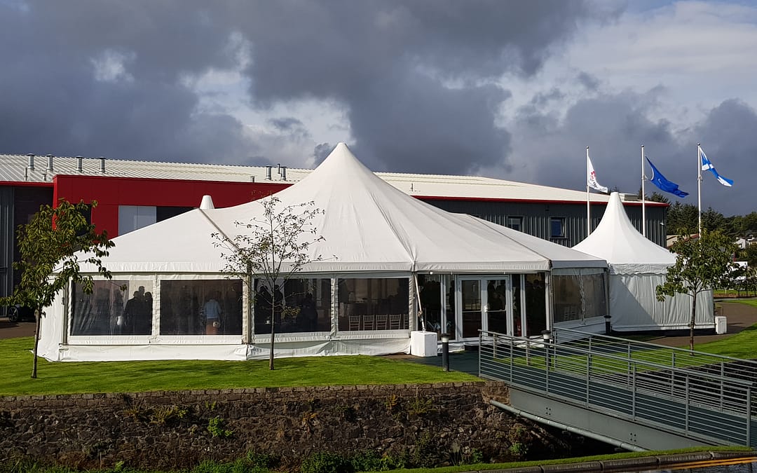 Purvis Marquees, Bridge of Weir Leather, peaked roof marquee, bespoke marquees, glazing, clear window walls, pvc windows, pagoda